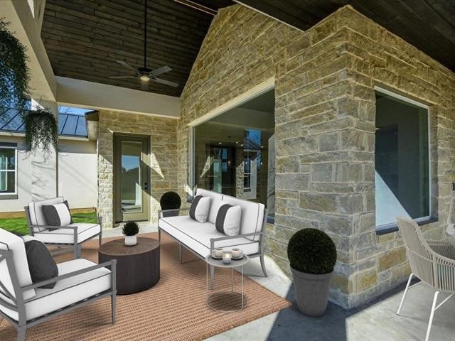 view of patio / terrace featuring an outdoor living space and ceiling fan