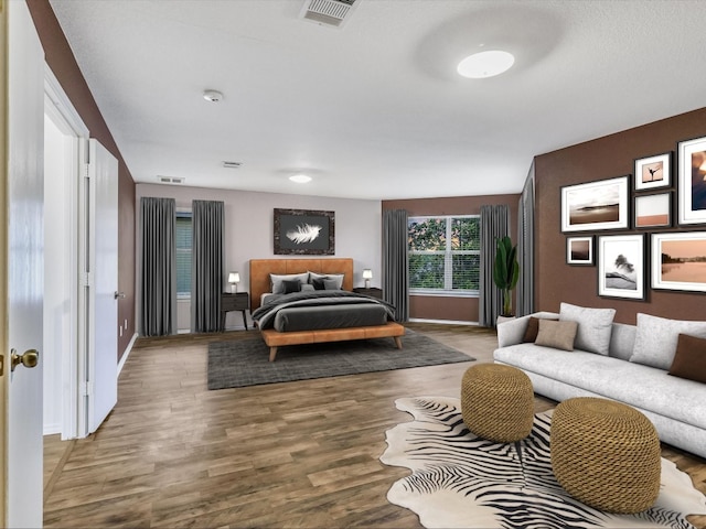 bedroom featuring wood-type flooring