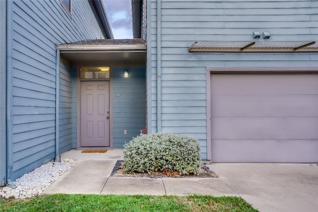 property entrance featuring a garage