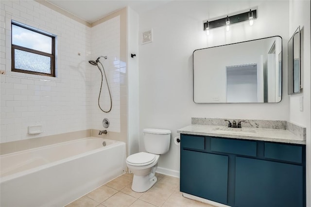 full bathroom with tile patterned floors, vanity, toilet, and tiled shower / bath