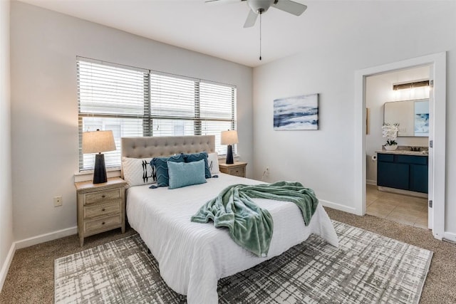 1201 Grove Blvd Unit 1102, Austin, TX 78741 - bedroom featuring carpet flooring, ensuite bathroom, and ceiling fan
