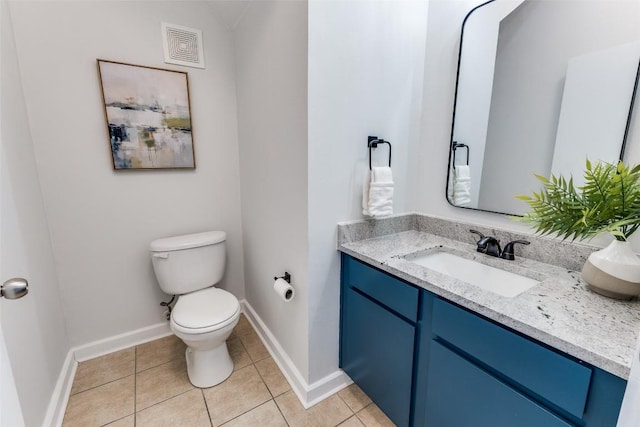 1201 Grove Blvd Unit 1102, Austin, TX 78741 - half bathroom featuring vanity and tile patterned flooring