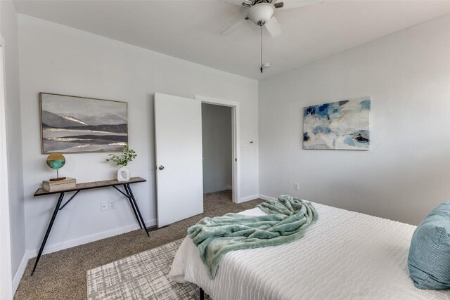 1201 Grove Blvd Unit 1102, Austin, TX 78741 - carpeted bedroom featuring a ceiling fan and baseboards