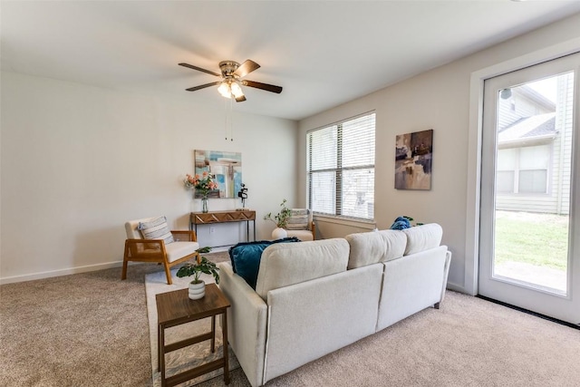 1201 Grove Blvd Unit 1102, Austin, TX 78741 - carpeted living area with a ceiling fan and baseboards