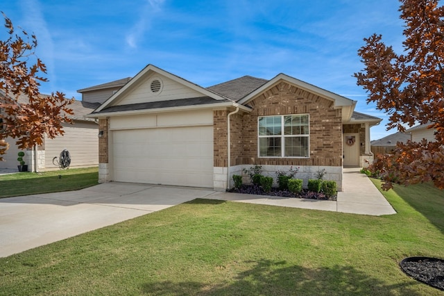 view of front of property featuring a garage and a front lawn