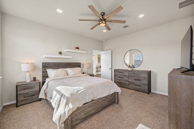 carpeted bedroom with ceiling fan