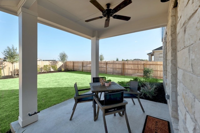 view of patio / terrace featuring ceiling fan