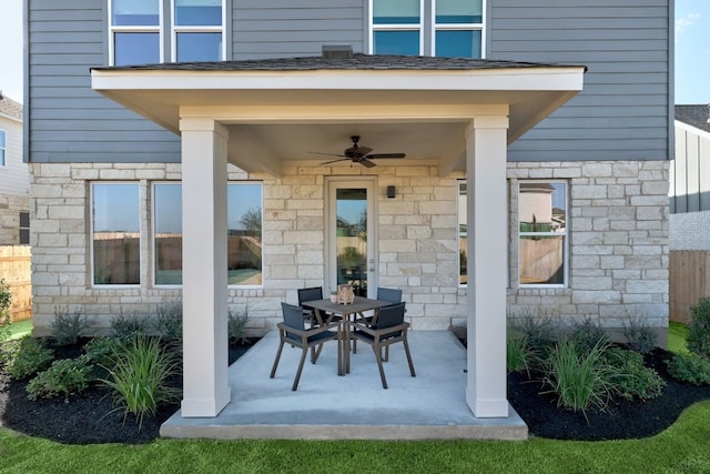 view of patio / terrace featuring ceiling fan