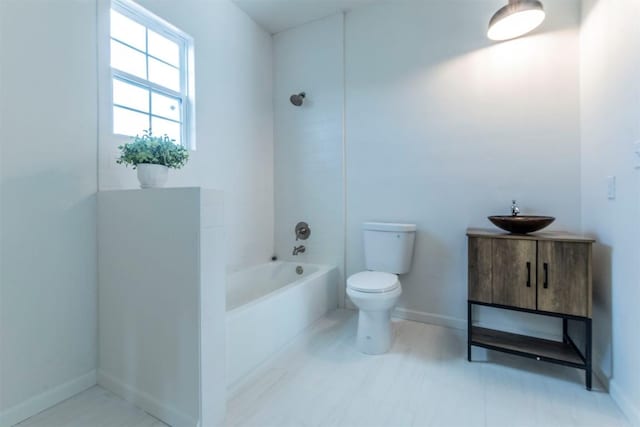 full bathroom featuring vanity, toilet, and shower with separate bathtub