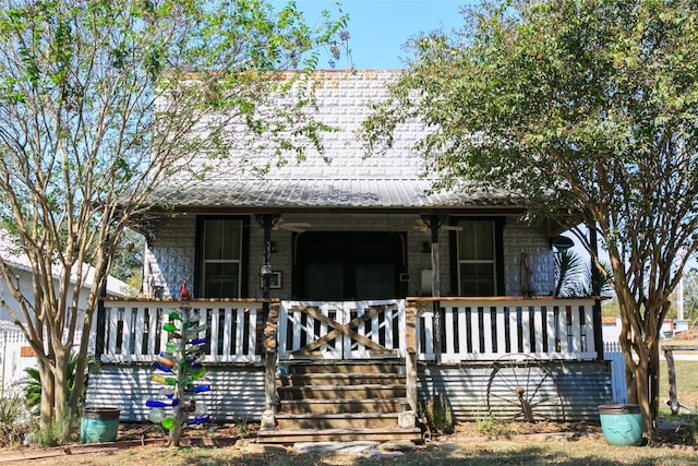 view of front of property featuring covered porch