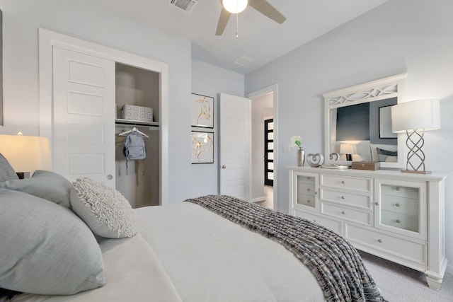 bedroom with carpet flooring, a closet, and ceiling fan