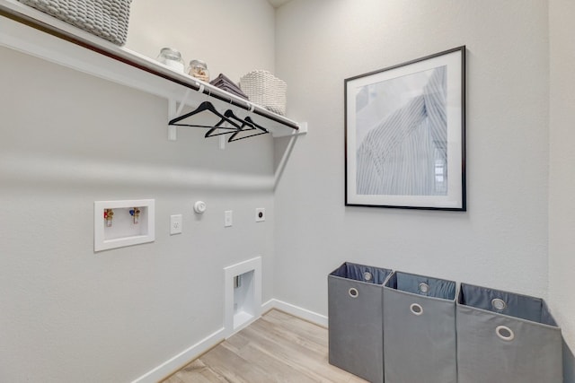 laundry room with hookup for an electric dryer, washer hookup, hardwood / wood-style flooring, and gas dryer hookup