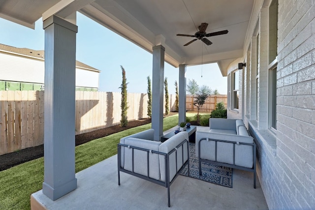 view of patio featuring an outdoor living space and ceiling fan