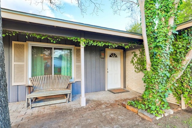 entrance to property with covered porch