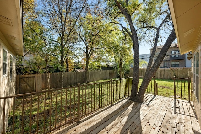 deck featuring a lawn