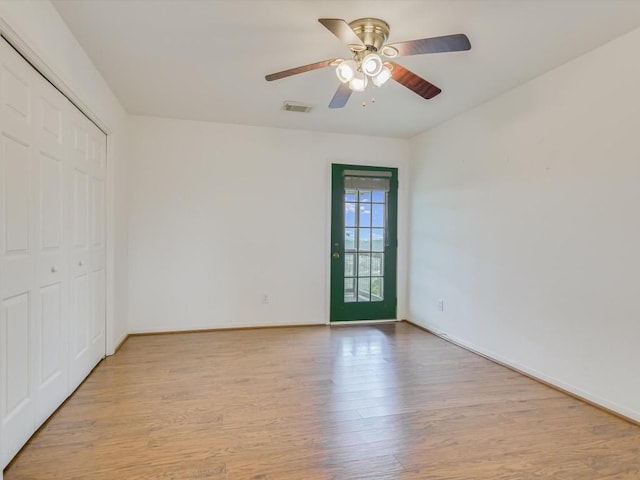 unfurnished room with light hardwood / wood-style floors and ceiling fan