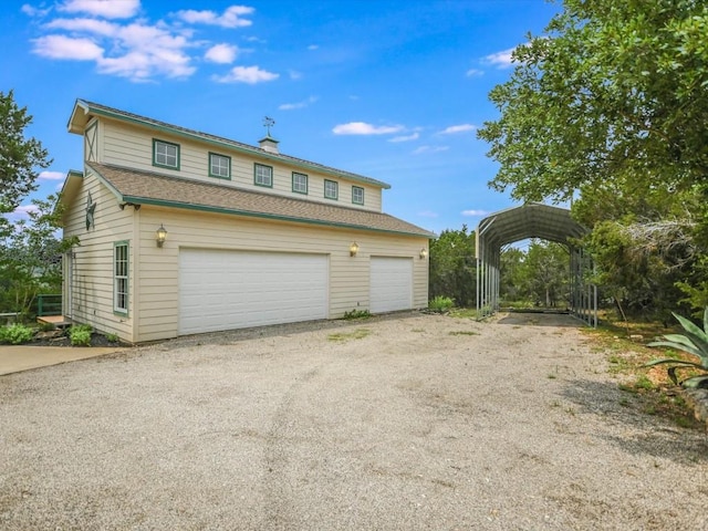 garage with a carport