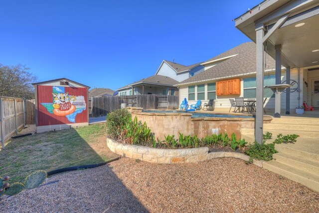 view of yard featuring a wooden deck