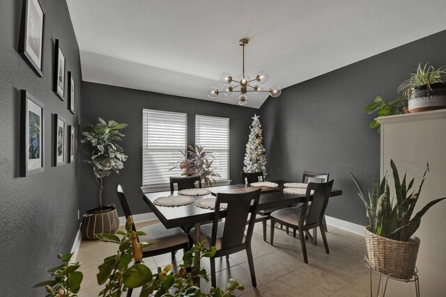 dining area featuring a chandelier