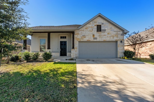 view of front facade featuring a garage and a front yard