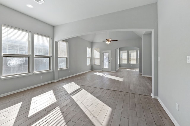 interior space with ceiling fan and lofted ceiling