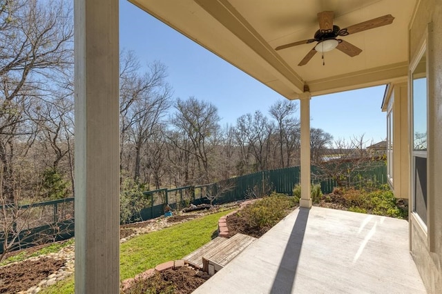 view of patio featuring ceiling fan