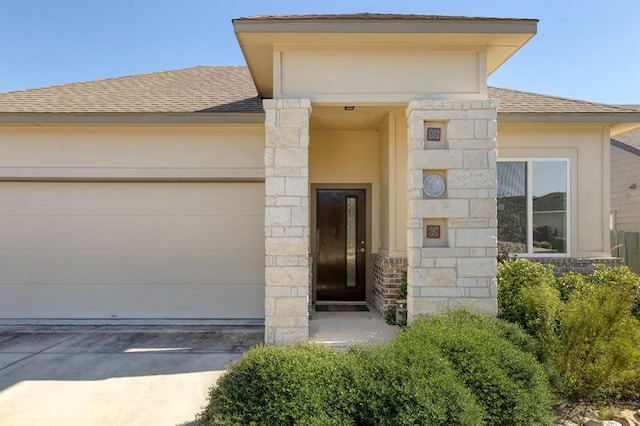 property entrance with a garage