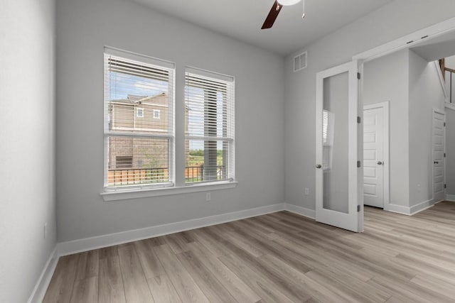 6304 Rotunda Vw, Austin, TX 78747 - unfurnished bedroom featuring light wood-type flooring and a ceiling fan
