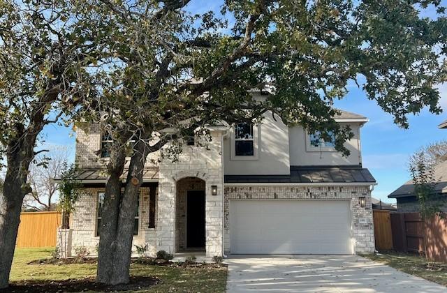 view of front of property featuring a garage