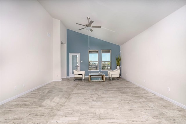 unfurnished room with ceiling fan, high vaulted ceiling, and french doors