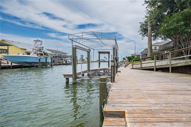246 Starboard Ave, Rockport, TX 78382 - dock featuring boat lift and a water view