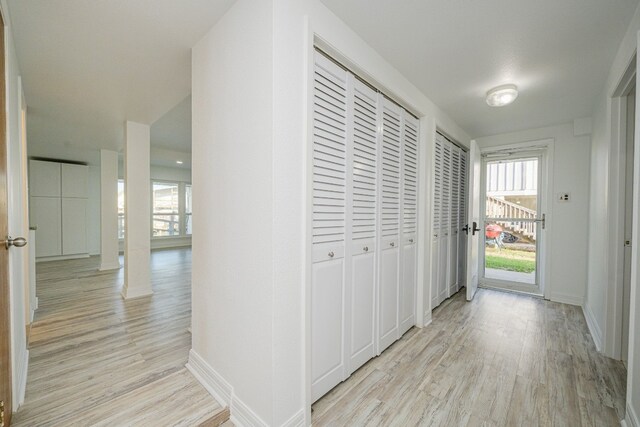 246 Starboard Ave, Rockport, TX 78382 - hallway with light wood-style flooring and baseboards