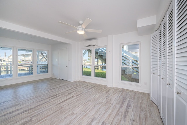 246 Starboard Ave, Rockport, TX 78382 - unfurnished sunroom with a wall unit AC and healthy amount of natural light