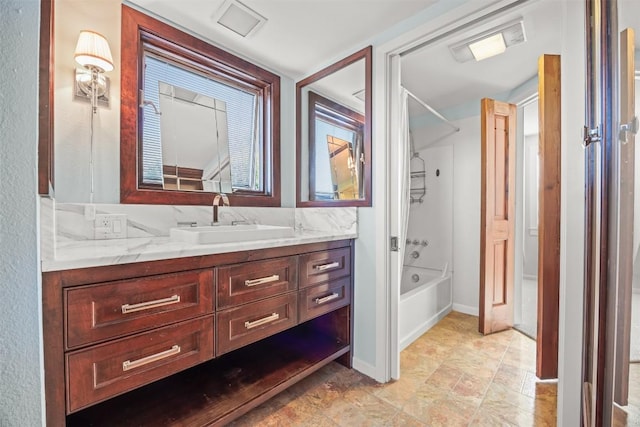 bathroom with vanity and shower / bathtub combination