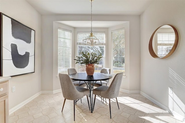 dining area with a notable chandelier