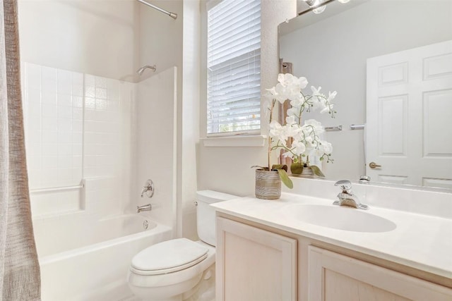 full bathroom with vanity, toilet, and shower / bath combo with shower curtain