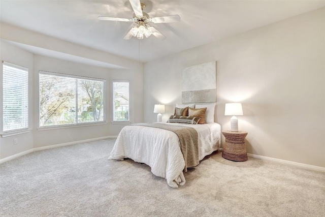 bedroom featuring ceiling fan and carpet floors