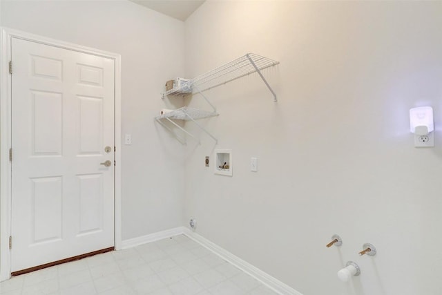 washroom with gas dryer hookup and washer hookup