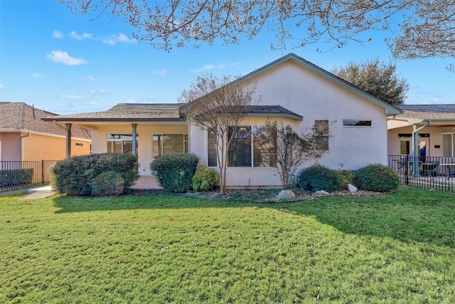 exterior space with a front yard