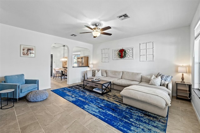 living room featuring ceiling fan