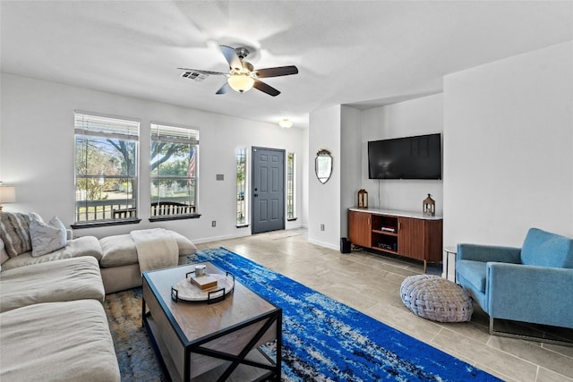 living room with ceiling fan