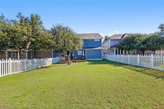 view of yard featuring a deck