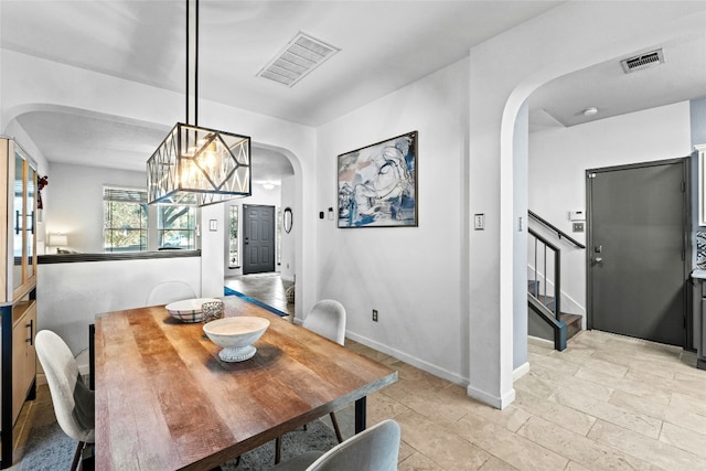 dining room featuring a chandelier