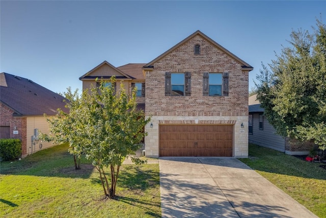 view of front of property with a garage and a front yard