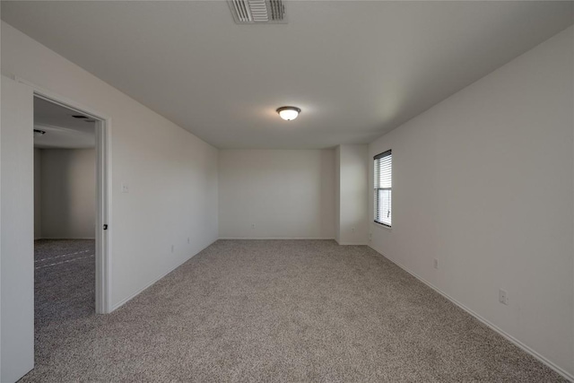 empty room with carpet floors