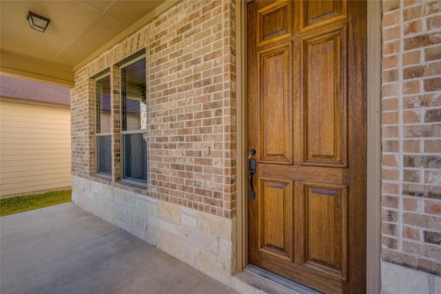 entrance to property with covered porch