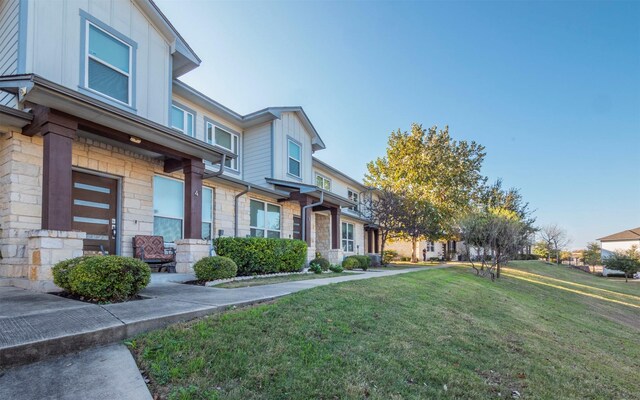 exterior space featuring a lawn