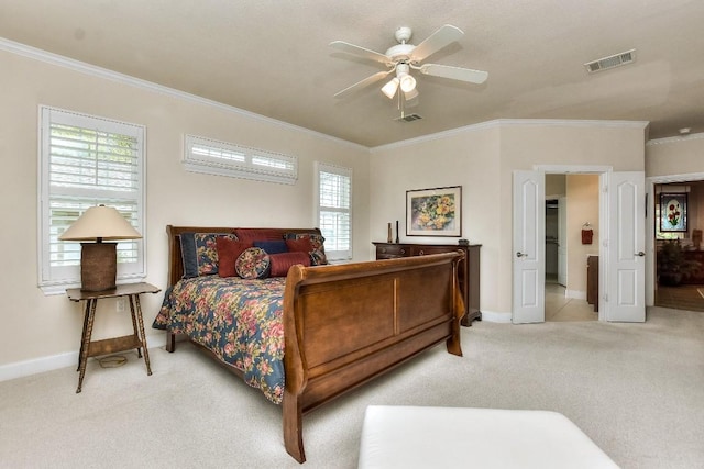 bedroom featuring light carpet, ceiling fan, and crown molding