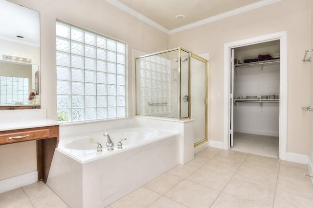 bathroom featuring tile patterned floors, vanity, crown molding, and plus walk in shower