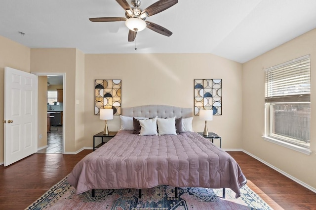 bedroom featuring lofted ceiling, ceiling fan, and dark wood-type flooring